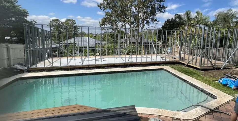 Poolside view with new construction